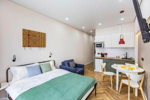 En eller flere senge i et værelse på ЖК ESTET, рядом MEGA Alma-Ata + 100 billeder