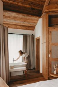 Postel nebo postele na pokoji v ubytování Hotel Rosenhof Murau