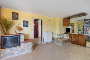 Kuchyň nebo kuchyňský kout v ubytování Lemon Green + 25 fotografií