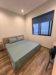 Postel nebo postele na pokoji v ubytování NS Home B5-301