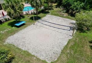 an aerial view of a volley ball net on the beach at Family Fun Getaway close to Disney in Kissimmee