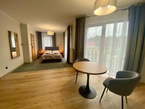 Postel nebo postele na pokoji v ubytování "Willa Octavia" Apartamenty , Pokoje