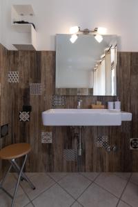 a bathroom with a sink and a mirror at B&B Trepo in Tropea