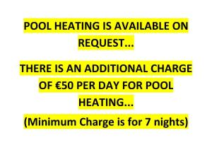 a sign that says pool heating is available on request at Villa Anastasia Sandy Beach Villas - Heated Private Overflow Pool - Hot Tub - Games Room - Private Beach Area in Polis Chrysochous