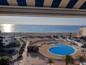 Bazén v ubytování Le charme du Lydia Playa nebo v jeho okolí