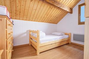 a small room with a bunk bed in a house at Chalet Sophie - Proche station de ski in Les Angles
