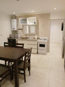 Kuchyň nebo kuchyňský kout v ubytování Departamento Studio Costa de Mar Río Grande - Tierra del Fuego + 8 fotografií