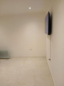 TV a/nebo společenská místnost v ubytování Departamento Studio Costa de Mar Río Grande - Tierra del Fuego