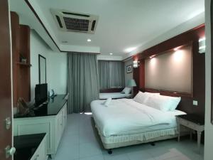 Katil atau katil-katil dalam bilik di Private Water Chalet Port Dickson