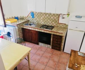 Kuchyň nebo kuchyňský kout v ubytování Casa Silvia trilo calagavetta + 10 fotografií