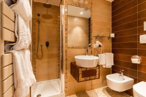 Koupelna v ubytování Hotel Villa Stella + 37 fotografií