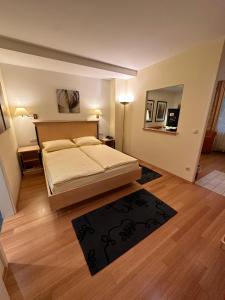 Postel nebo postele na pokoji v ubytování Hotel Viktoria