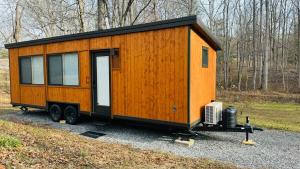 a tiny house is sitting on a trailer at Escape Tiny Two in Chattanooga