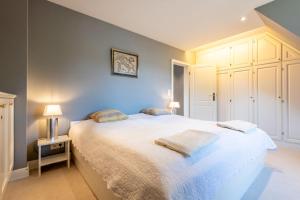 Voodi või voodid majutusasutuse Sonnenhues-Exkl-Haus-im-Herzen-Kampens toas