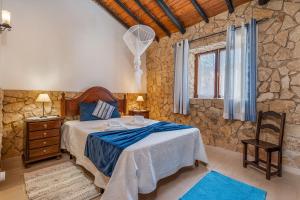 Postel nebo postele na pokoji v ubytování Horta Da Ti'mariana + 24 fotografií