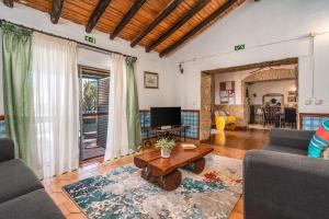 Posezení v ubytování Horta Da Ti'mariana