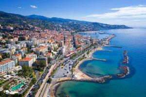 an aerial view of a city next to the water at Hotel Washington in Sanremo
