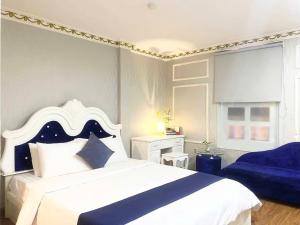 Ένα ή περισσότερα κρεβάτια σε δωμάτιο στο CROWNE BUI VIEN Hotel