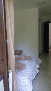 A bed or beds in a room at Apartment's Pita & Mare