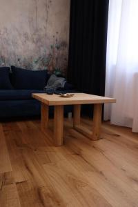 Χώρος καθιστικού στο Niebieski apartament w Wileńska Park i prywatne miejsce w garażu podziemnym