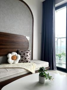 Ένα ή περισσότερα κρεβάτια σε δωμάτιο στο Khoaistay Homestay, Nera Garden Hue