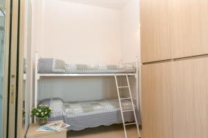 Voodi või voodid majutusasutuse Hotel Colonna toas