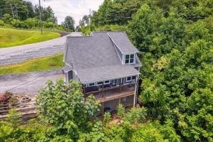 an overhead view of a house with a roof at Amazing Views, Hot Tub, Arcade & Firepit in Gatlinburg