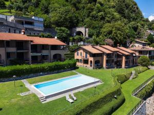 Swimmingpoolen hos eller tæt på Musso Waterside - by MyHomeInComo