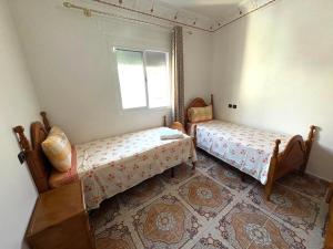 Postel nebo postele na pokoji v ubytování Beach House