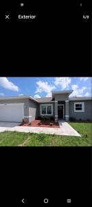 a picture of a large house with at Beautiful house in quiet place shared bath in Ocala