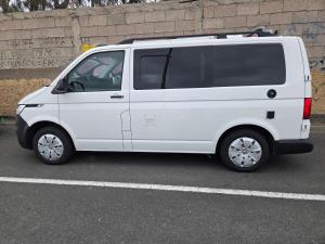 a white van parked in a parking lot at Autocaravana Camper in Las Palmas de Gran Canaria