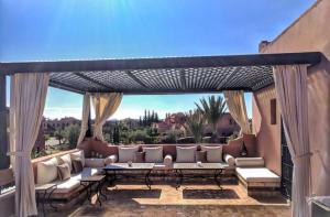Posezení v ubytování Villa Palmia piscine privée palmeraie Marrakech