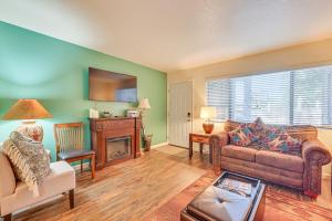 a living room with a couch and a fireplace at The Painted Pony Sedona Condo Pool and Gym Access in Sedona
