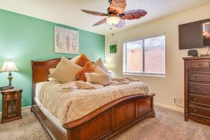 a bedroom with a bed and a ceiling fan at The Painted Pony Sedona Condo Pool and Gym Access in Sedona +23 photos