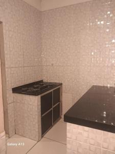 アキダウアナにあるRancho Radicalのキッチン(カウンター、コンロ付)