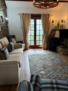 Χώρος καθιστικού στο Coach House, Gogarth
