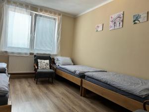 Postel nebo postele na pokoji v ubytování U Vrbů