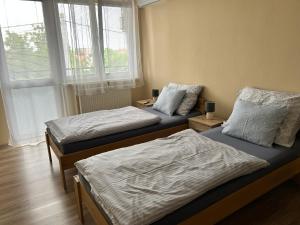 Postel nebo postele na pokoji v ubytování U Vrbů