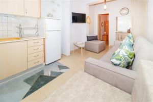 Televisyen dan/atau pusat hiburan di Poseidon Sea Front House