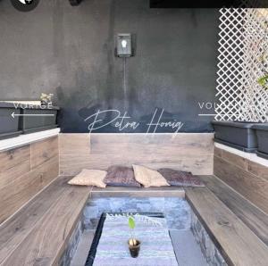 a room with two pillows sitting on a wooden floor at Quickcasaspain sl in Rojales