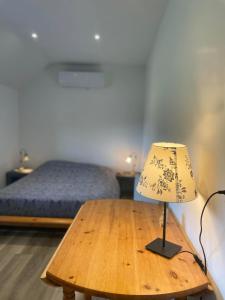 Posteľ alebo postele v izbe v ubytovaní Gîte à la campagne groupe et famille 3 chambres Espace Jacuzzi hammam SPA