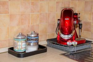 Příslušenství pro přípravu čaje a kávy v ubytování La casa di Bubi + 12 fotografií