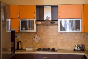 Kuchyň nebo kuchyňský kout v ubytování La casa di Bubi