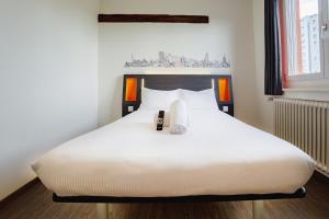 Katil atau katil-katil dalam bilik di easyHotel Zürich City West