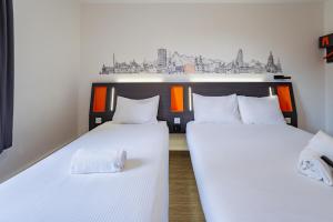 Katil atau katil-katil dalam bilik di easyHotel Zürich City West