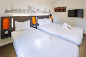 Katil atau katil-katil dalam bilik di easyHotel Zürich City West