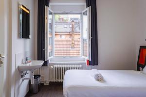Katil atau katil-katil dalam bilik di easyHotel Zürich City West