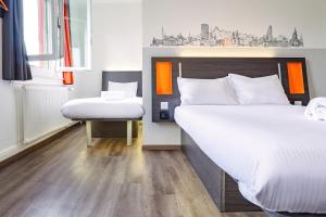 Katil atau katil-katil dalam bilik di easyHotel Zürich City West