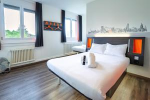 Katil atau katil-katil dalam bilik di easyHotel Zürich City West