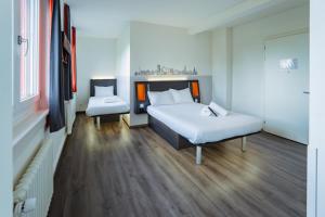 Katil atau katil-katil dalam bilik di easyHotel Zürich City West